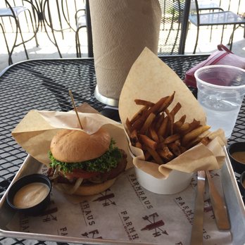 Farmhaus Burger - Grilled chicken gluten free bun, grilled onions, lettuce & tomatoes plus garlic aloe plus fries. Love it! - Burgers Near Me - Augusta, Georgia Farmhaus Burger - Grilled chicken gluten free bun, grilled onions, lettuce & tomatoes plus garlic aloe plus fries. Love it! - Burgers Near Me - Augusta, Georgia