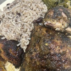 Jerk chicken, plantains, rice, and collard greens.