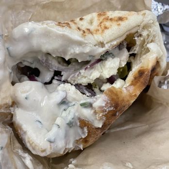 Pita Pocket and More - Lamb Kabob Pita topped generously with tahini - Middle Eastern Near Me - Mount Laurel, New Jersey Pita Pocket and More - Lamb Kabob Pita topped generously with tahini - Middle Eastern Near Me - Mount Laurel, New Jersey