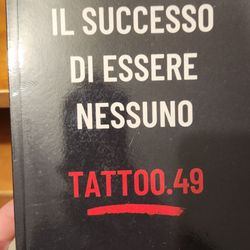 Ink for Passion - An autobiography he gave me with the shop name and his name (guy needs an ego check)