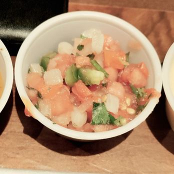 ABBQ - Some kind of so-called barbecue sauce on the left. Pico de gallo in the middle and for some reason some kind of cheese sauce. Boutique - Barbeque Near Me - Atlantic Beach, Florida