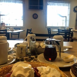 Pancake breakfast with fruit in a small comfortable atmosphere.