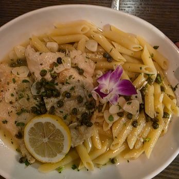 Ruocco’s Restaurant - Chicken Picatta with penne pasta in a lemon caper sauce! - Italian Near Me - Boynton Beach, Florida Ruocco’s Restaurant - Chicken Picatta with penne pasta in a lemon caper sauce! - Italian Near Me - Boynton Beach, Florida