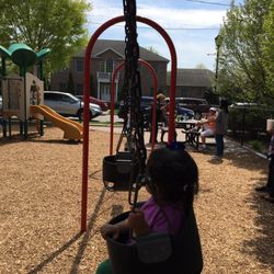 East Williston Toddler Park - Two baby swings and two bigger kid swings. Baby swings are literally for babies.