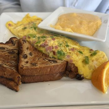 Keke's Breakfast Cafe - Western Omelet with cheese grits - Breakfast & Brunch Near Me - Nashville, Tennessee Keke's Breakfast Cafe - Western Omelet with cheese grits - Breakfast & Brunch Near Me - Nashville, Tennessee