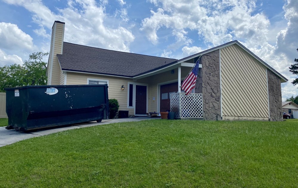 Slide of J&M Roofing Services