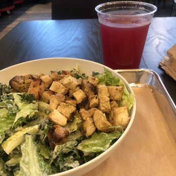 CoreLife Eatery - Chicken kale Caesar salad with beet lemonade. - Salad Near Me - Greensboro, North Carolina