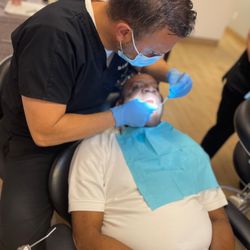 Smiles Today Dental Las Vegas - Dr. Kerio working on dental implants on patient