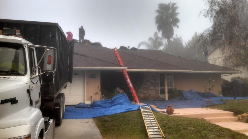 Slide of Wolfe Roofing Company