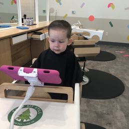 Our little guy getting his hair cut for the first time in almost 9 months! Our little guy getting his hair cut for the first time in almost 9 months!