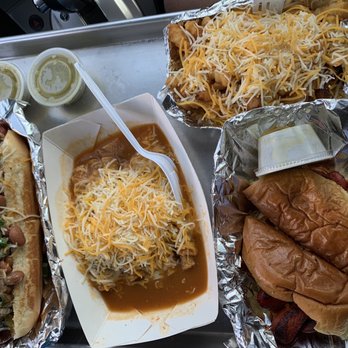 El Perrito - The O.G doggie is on the left, an order of 6 El Chuco tacos in the middle, and an ELP doggie combo on the right. - Tacos Near Me - Austin, Texas