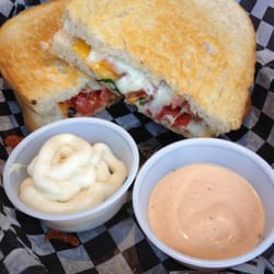 Melt Grilled Cheese - Tattooed chicken grilled cheese with extra garlic mayo and chipotle dip