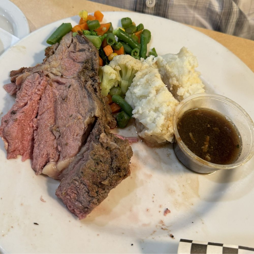 Prime rib, mashed potatoes and vegetables. Prime rib, mashed potatoes and vegetables.