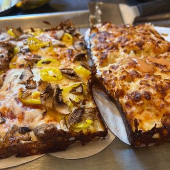 Market 22 - Left is pepperoni, mushroom, and banana peppers.  Right is the famous Reuben Pizza.   Both were more delicious than should be allowed. - Pizza Near Me - Maple City, Michigan