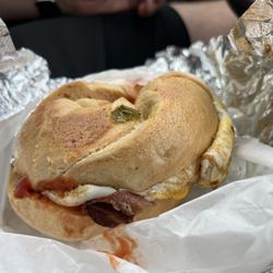 Hamburg Hot Bagels - Bacon egg and cheese on jalapeno bagel