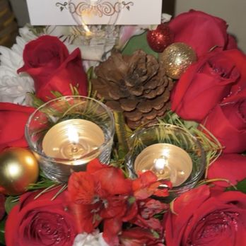 Fleurtina - Small Christmas arrangement with candles - Floral Designers Near Me Fleurtina - Small Christmas arrangement with candles - Floral Designers Near Me