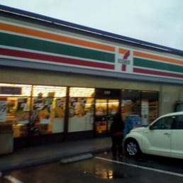 a car parked in front of the store a car parked in front of the store