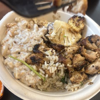 Dig Inn - a plate of food with rice and meat - New American Near Me - New York, New York Dig Inn - a plate of food with rice and meat - New American Near Me - New York, New York