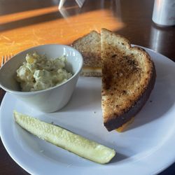 Daphne Mae Cafe - Grilled cheese sandwich with side of potato salad