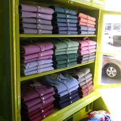 J McLaughlin - Men's shirts stacked to striped perfection at the Bellevue Ave store.