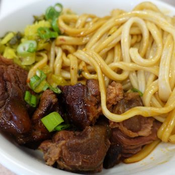Mandarin Deli - Dry spicy beef noodle soup (so no soup), after being mixed up. Very deliciously chewy noodles with groove in the middle picking up sauce - Chinese Near Me - Monterey Park, California