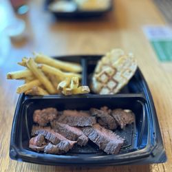 Urban Plates - Kids Grilled Grass Fed Steak: signature spice rubbed, 100% grass-fed steak, grilled medium rare w/choice of side, bread & drink | $12.99