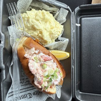 The Lobster Cage - Lobster roll with potato salad cold lobster roll - Seafood Near Me - Pensacola, Florida The Lobster Cage - Lobster roll with potato salad cold lobster roll - Seafood Near Me - Pensacola, Florida