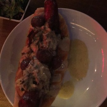 Townhouse - Daily special-foot long hot dog with sautéed pearl onions, braised short rib and creamy cheese sauce - New American Near Me - Birmingham, Michigan Townhouse - Daily special-foot long hot dog with sautéed pearl onions, braised short rib and creamy cheese sauce - New American Near Me - Birmingham, Michigan