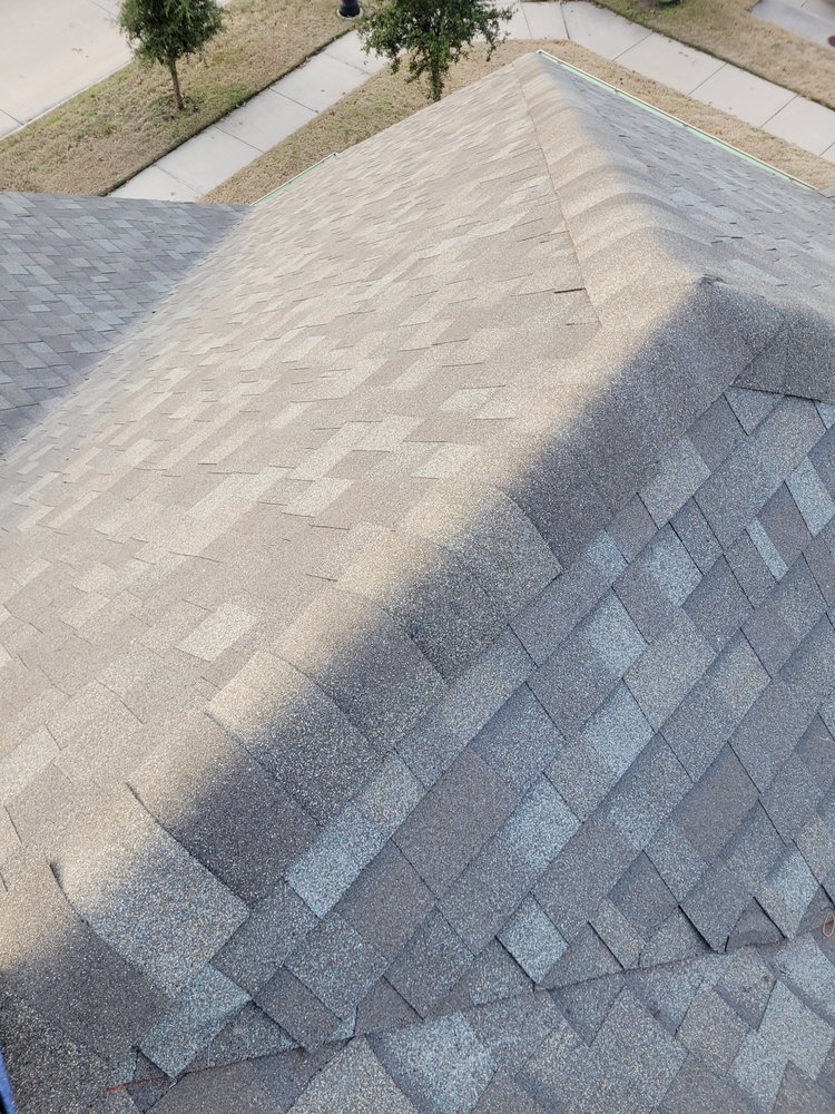 Slide of LTZ Roofing Pros