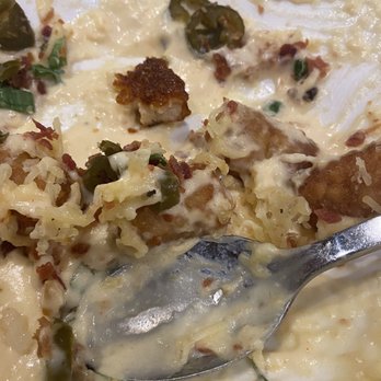 Walnut Grill - Robinson - Loaded Tater Tots and a gnat...(right above the spoon) - American Near Me - Robinson Township, Pennsylvania