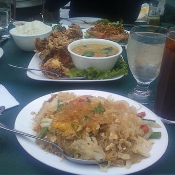 SriPraPhai Thai Restaurant - Sauteed bean thread with egg, shrimp and chicken, fried soft shell crab w/ green curry sauce w/ pineapple, pumpkin & long bean. - Thai Near Me - Woodside, New York SriPraPhai Thai Restaurant - Sauteed bean thread with egg, shrimp and chicken, fried soft shell crab w/ green curry sauce w/ pineapple, pumpkin & long bean. - Thai Near Me - Woodside, New York