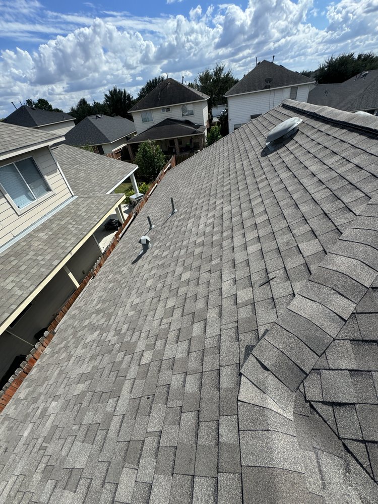 Slide of DMC Roofing