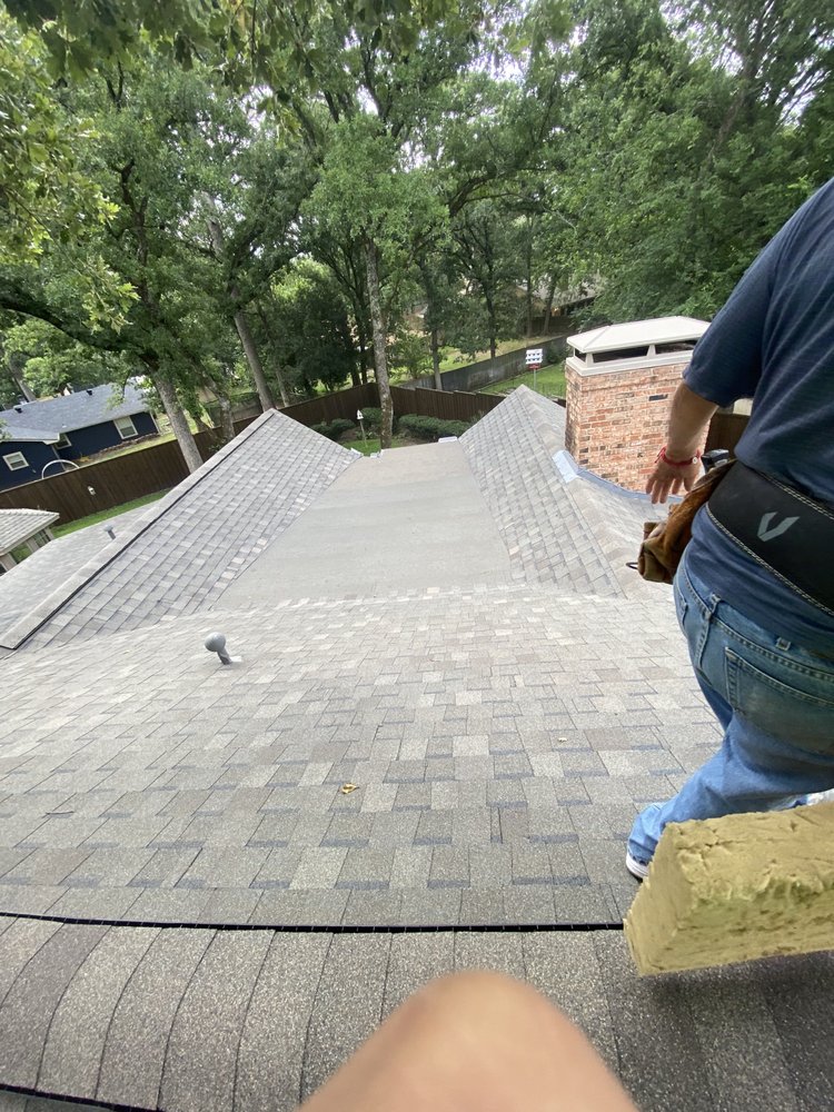 Slide of Ruebens Roofing