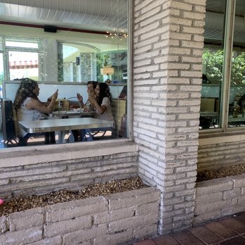 Howley's Restaurant - Patio view of inside - Diners Near Me - West Palm Beach, Florida Howley's Restaurant - Patio view of inside - Diners Near Me - West Palm Beach, Florida