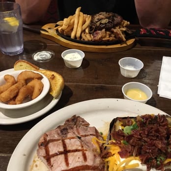 Buzz Inn Steakhouse - His- The works steak and 2 sides. Mine yummy, thick pork chop with choice of 2 sides. All done perfectly. - Sports Bars Near Me - Granite Falls, Washington Buzz Inn Steakhouse - His- The works steak and 2 sides. Mine yummy, thick pork chop with choice of 2 sides. All done perfectly. - Sports Bars Near Me - Granite Falls, Washington