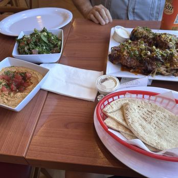 Chicken Maison - Whole spicy chicken with spicy hummus and tabbouleh. We couldn't finish all the food. - Mediterranean Near Me - Fountain Valley, California Chicken Maison - Whole spicy chicken with spicy hummus and tabbouleh. We couldn't finish all the food. - Mediterranean Near Me - Fountain Valley, California