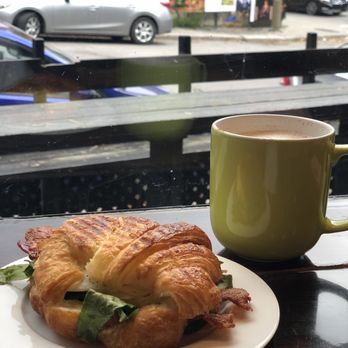 Marius et Fanny - The Croissant Marius with Bacon and Chai Latte - Bakeries Near Me - Montreal, Quebec Marius et Fanny - The Croissant Marius with Bacon and Chai Latte - Bakeries Near Me - Montreal, Quebec