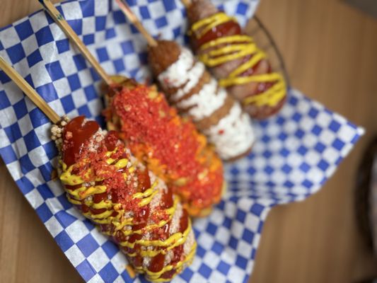Two Hands Corn Dogs by null