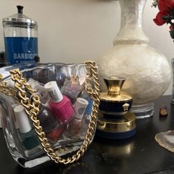 HomeGoods - Purse vase holding nail polishes on my nightstand. All contained in one place and easy to reach for!