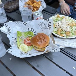 Smash burger and chicken Caesar salad
