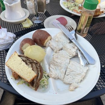 Old Post Office Restaurant - Potato's, bread slices, an onion, coleslaw, and White Fish. And the seasoning I used for the fish is right there with the green top on it - Seafood Near Me - Ephraim, Wisconsin