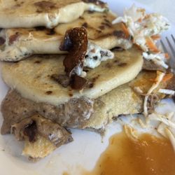 Carlos's Kitchen - Pupusa's are delicious! The sauce and cabbage was perfect. The hotter sauce was too hot for me. I will be back!
