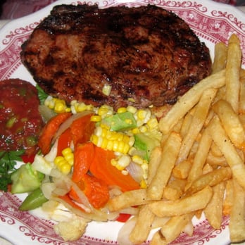 The Hitching Post 2 - Steak, vegetables, fries, and salsa - Steakhouses Near Me - Buellton, California The Hitching Post 2 - Steak, vegetables, fries, and salsa - Steakhouses Near Me - Buellton, California