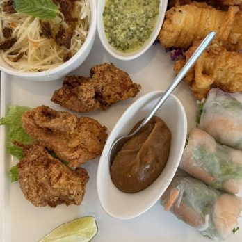 Rin-Tei - Rin-Tei plate with spring rolls, fried chicken, and fried calamari. - Asian Fusion Near Me - San Mateo, California Rin-Tei - Rin-Tei plate with spring rolls, fried chicken, and fried calamari. - Asian Fusion Near Me - San Mateo, California