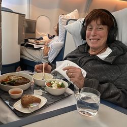 Delta Air Lines - Enjoying a meal in our seat