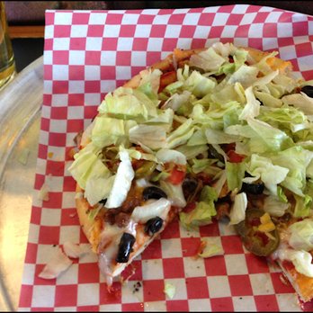 Campelli's Pizza - La Fiesta," which is a Mexican-inspired pizza. The menu describes it as "Seasoned taco meat, olive, onion, jalapeno, tomato, cheddar cheese - Pizza Near Me - Roseville, California Campelli's Pizza - La Fiesta," which is a Mexican-inspired pizza. The menu describes it as "Seasoned taco meat, olive, onion, jalapeno, tomato, cheddar cheese - Pizza Near Me - Roseville, California