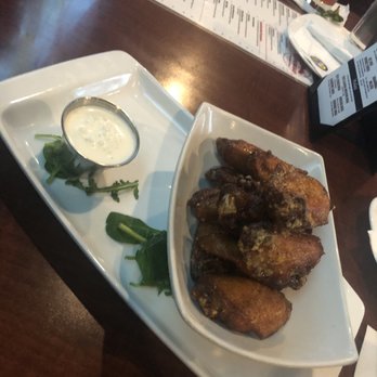 Avenue American Bistro - Smoked garlic parm wings - Sports Bars Near Me - Wayne, Michigan