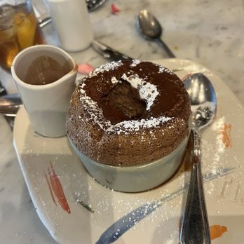 rise soufflé - Fort Worth - Chocolate soufflé with sauce. - French Near Me - Fort Worth, Texas rise soufflé - Fort Worth - Chocolate soufflé with sauce. - French Near Me - Fort Worth, Texas