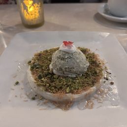 This delicacy, a dessert by name osmaliyeh , was made fresh in Laylas kitchen , but seemed it was designed in heaven . This delicacy, a dessert by name osmaliyeh , was made fresh in Laylas kitchen , but seemed it was designed in heaven .