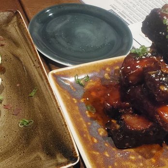 Reunion Kitchen + Drink - I ended up only ordering appetizers ribs (*), ahi tuna, angel  eggs, sliders, calamari, all tasty.  *definitely a repeat - New American Near Me - Laguna Beach, California
